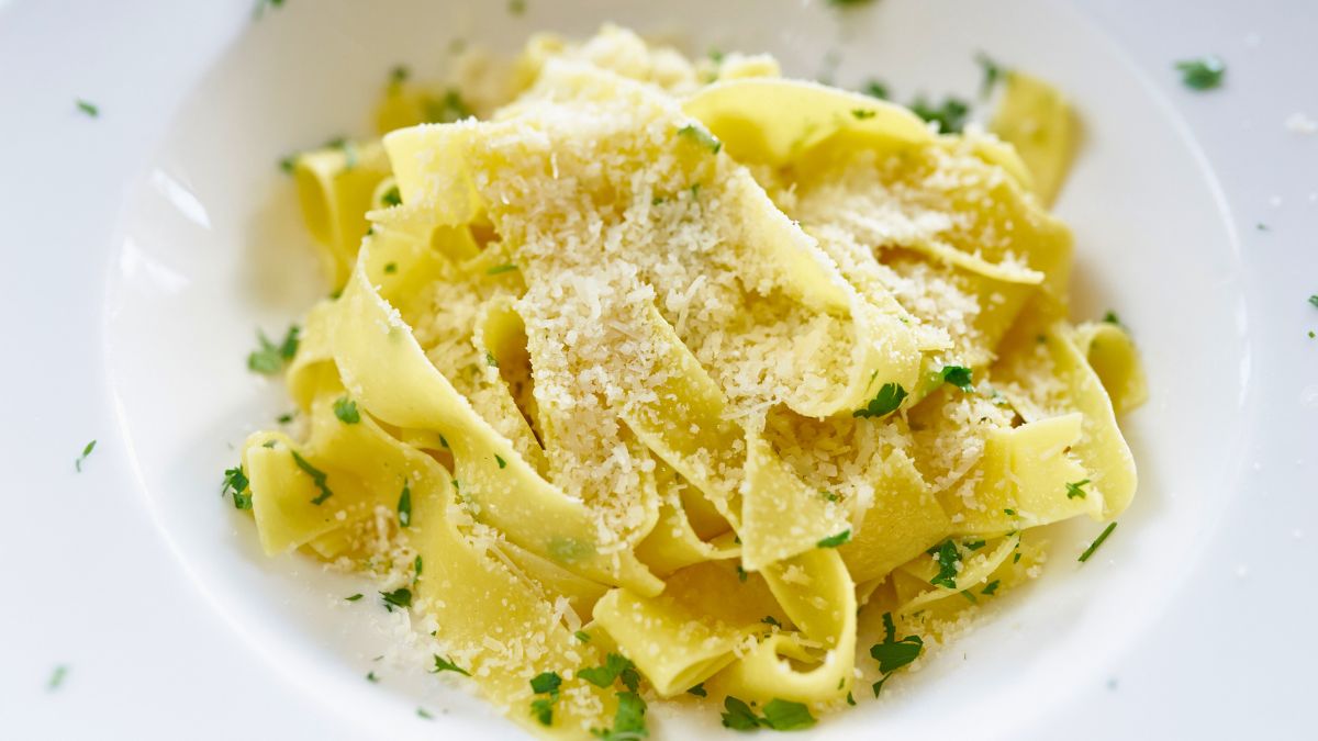 Adding more cheese and seasoning to fix an Alfredo with too much butter