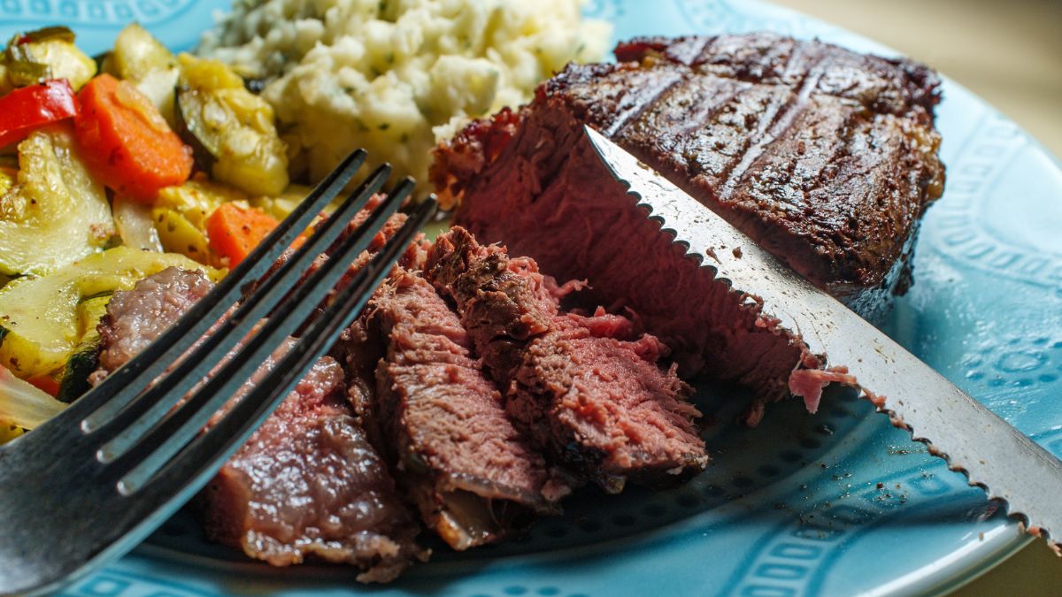 Filet Mignon Served With Steamed Vegetables and Stir Fried Rice