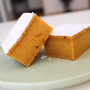 gooey pumpkin bars with sugar on top