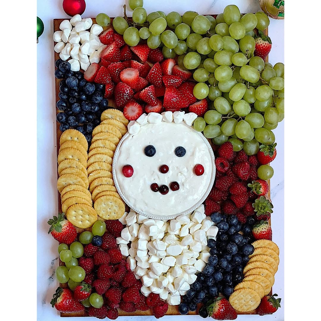 Make a cute Santa inspired charcuterie board for your Christmas gatheringsInstructions https tastyoven.com santa charcuterie board