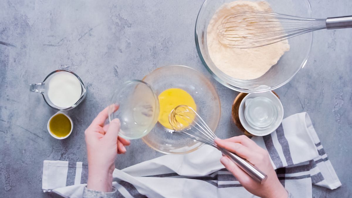 Making Jiffy cornbread muffins with buttermilk