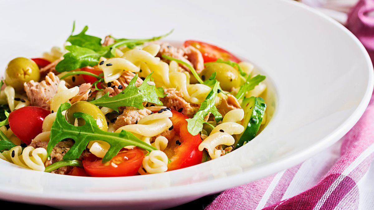 No-Milk Tuna Helper served with fresh veggies, arugula, and olives