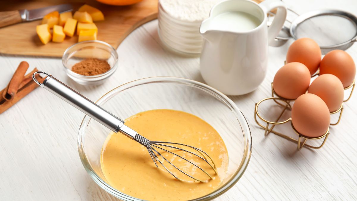 Preparing Pumpkin Muffin Batter With Milk