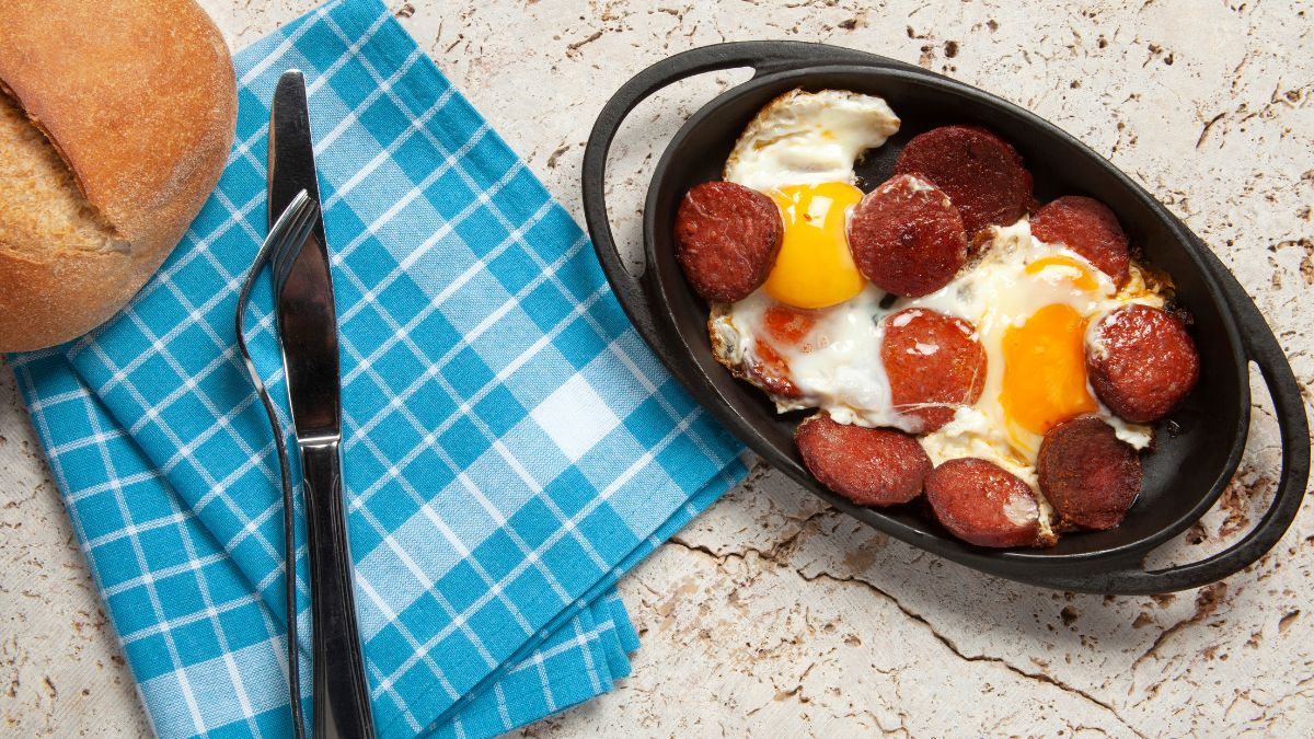 Summer Sausage Served With Fried Eggs and Rye Bread