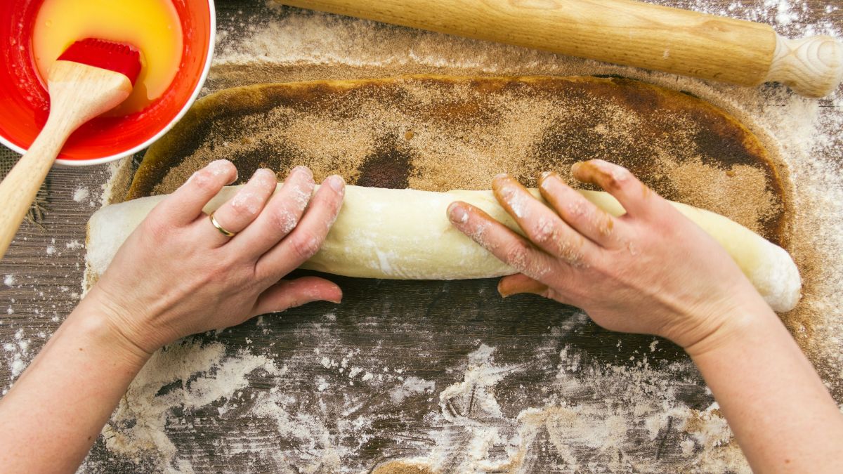Woman Rolling in the Cinnamon Roll