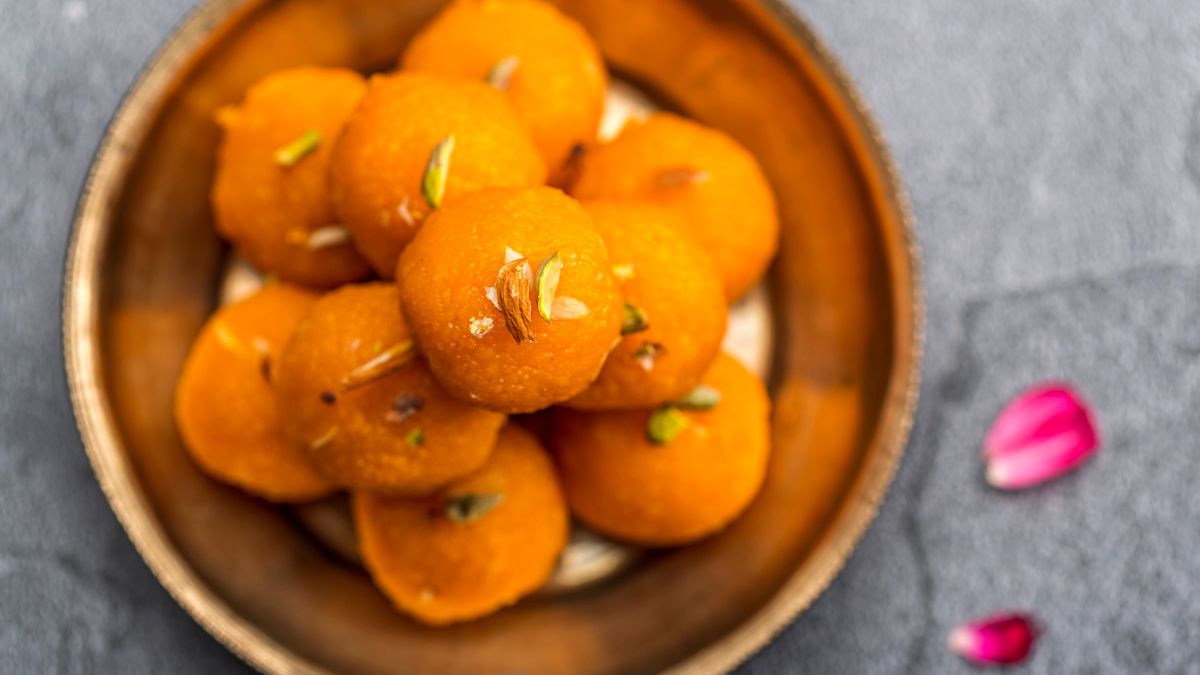 a bowl filled with Indian desserts laddu
