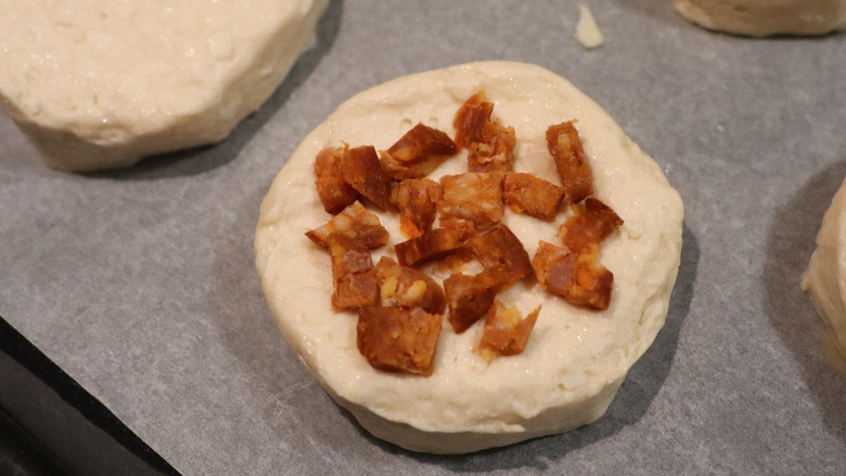 add meat leftovers on pillsbury biscuits