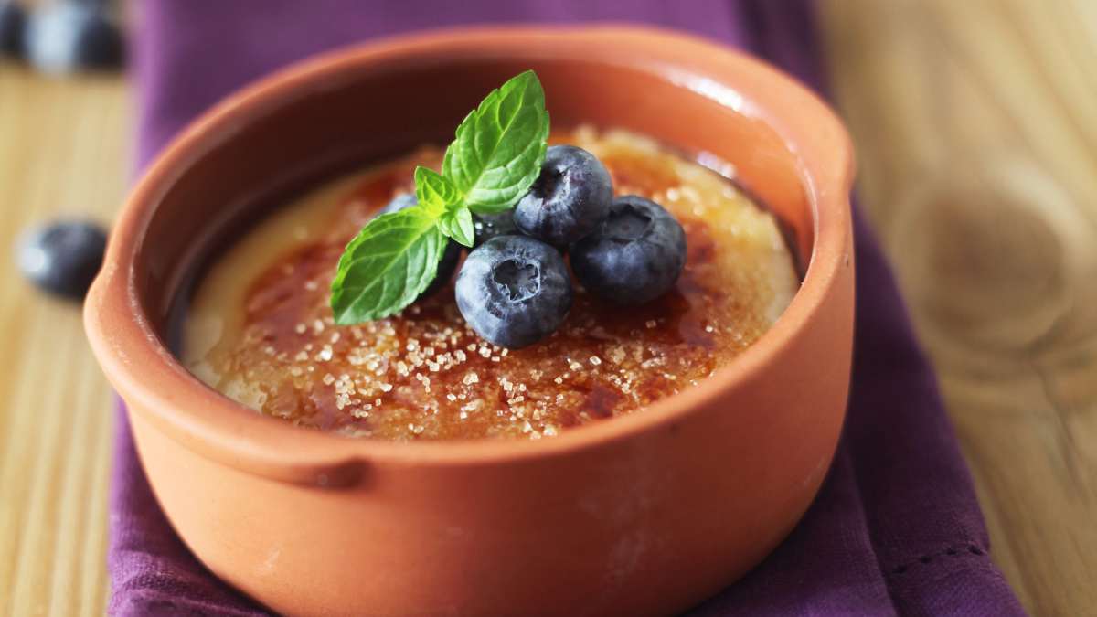 blueberry as decoration on Crème Brulée
