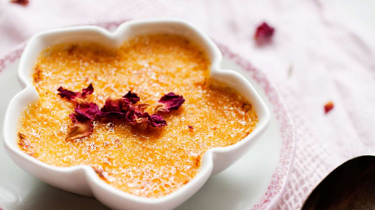 dry flowers as decoration on Crème Brulée