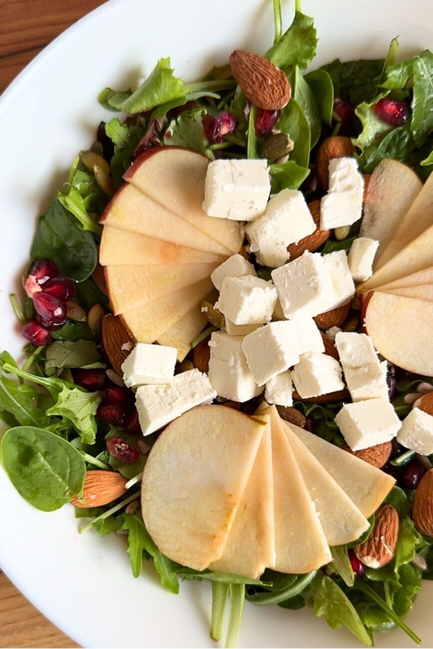 healthy thanksgiving salad with apples and almonds and feta