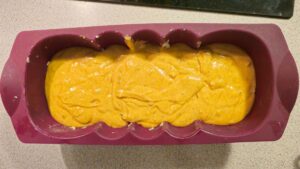 pumpkin bread mixture in the loaf pan
