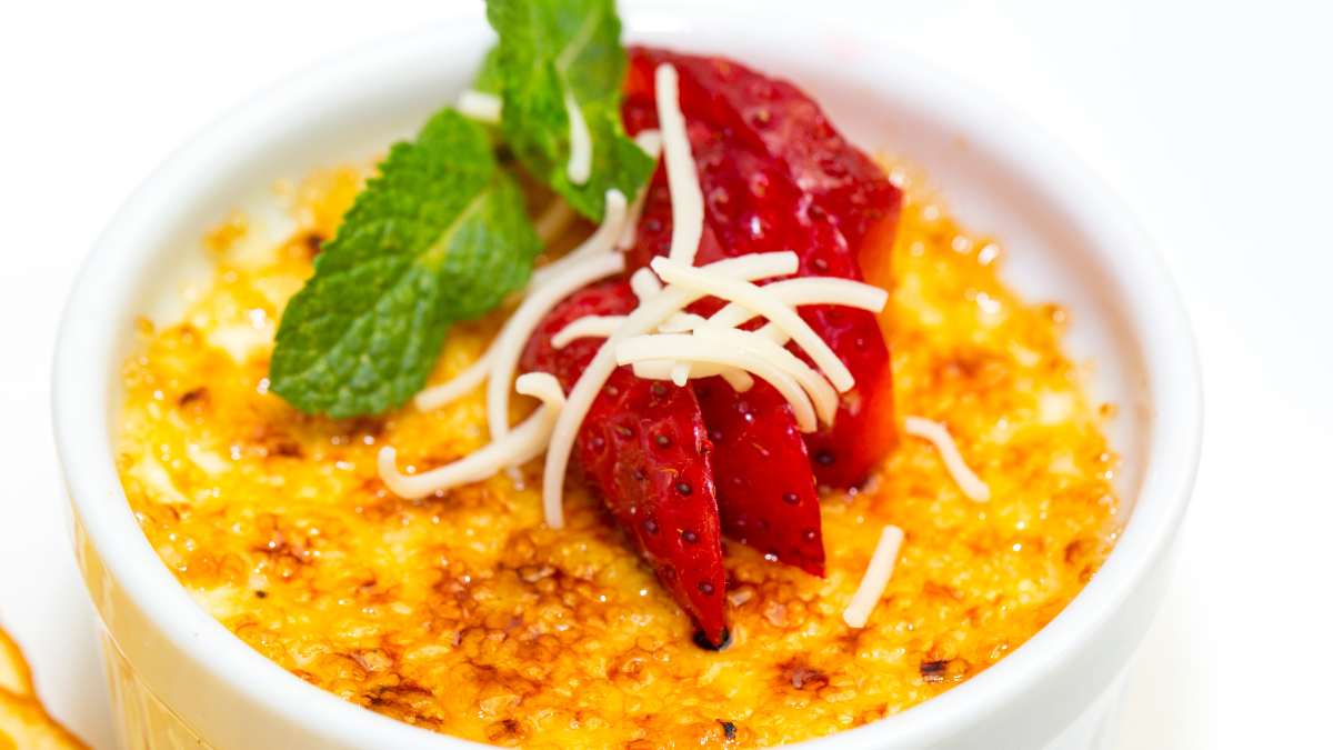 shredded white chocolate as decoration on Crème Brulée