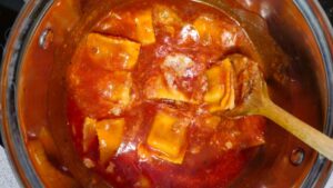 sprinkle beef ravioli with parmesan